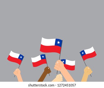Vector illustration hands holding Chile flags isolated on gray background