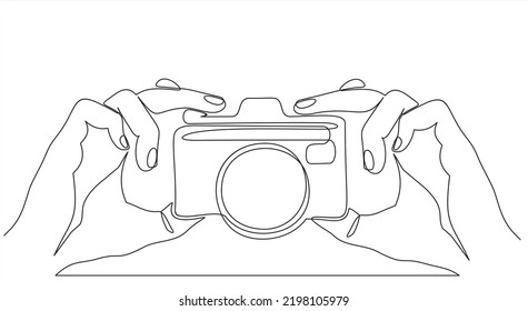 Ilustración vectorial de las manos sosteniendo una cámara digital - dibujo continuo de línea