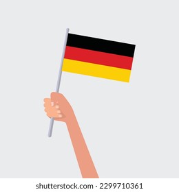 Vektorgrafik-Hände, die deutsche Flaggen auf weißem Hintergrund halten