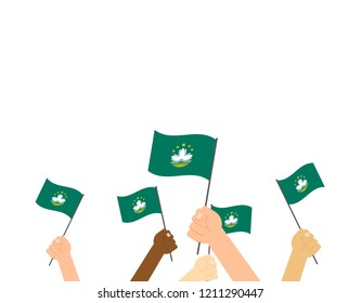 Vector illustration hands holding Macau flags isolated on background 