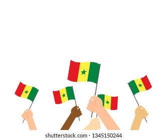 Vector illustration of hands holding Senegal flags isolated on white background