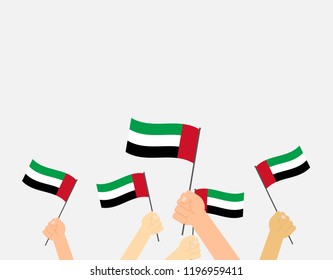 Vector illustration hands holding United Arab Emirates flags on white background