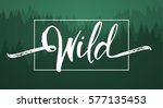 Vector illustration: Handwritten  brush lettering of Wild on green forest background. 
