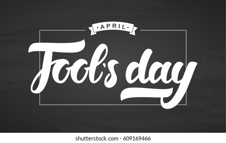 Vector illustration: Handwritten brush lettering of April Fools Day in frame on chalkboard background.  