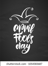 Vector illustration: Handwritten modern type lettering of April Fools Day on chalkboard background