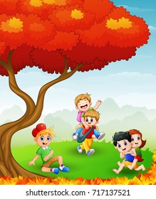 Vector illustration of Happy children playing in the autumn trees
