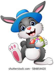 Vector illustration of Happy easter bunny wearing a hat carrying eggs