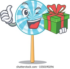 Vector illustration of happy lollipop with gift box