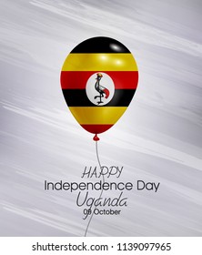 Vector illustration of Happy Uganda Independence Day 09 October. Waving flags isolated on gray background.