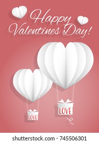 Vector illustration of "Happy Valentines Day" text in white and paper cut white heart shape hot air balloons with hanging gift box on red background. Concept of love and valentine day.