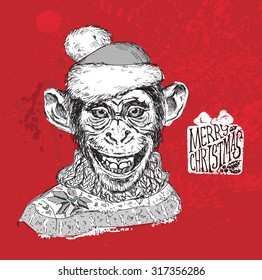 Vector illustration, Head chimpanzee in a cap. Merry Christmas card.