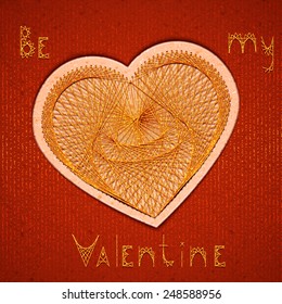 Vector illustration of heart embroidered on cardboard.