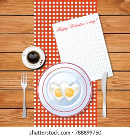 Vector illustration of heart shaped fried eggs on white plate and cup of coffee with heart on chequered tablecloth and clear sheet with title happy valentine's day and copyspace on wooden surface.