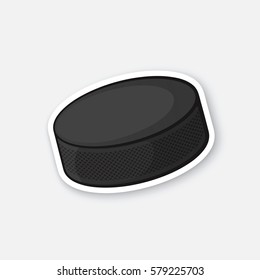 Vector illustration. Hockey puck. Cartoon sticker in comics style with contour. Decoration for greeting cards, posters, patches, prints for clothes, emblems