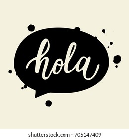 Vector illustration of 'Hola' calligraphy, Spanish translation of Hello phrase. Hand lettering in speech bubble.