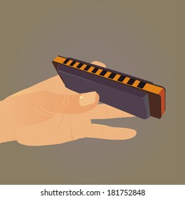 vector illustration of human hand holding a harmonica