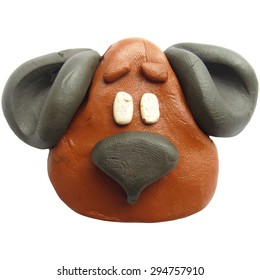 Vector illustration. Icon of plasticine head of dog isolated on white background. 