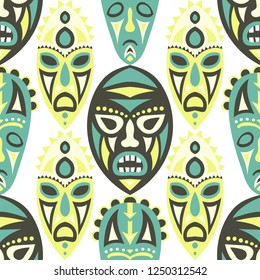 Vector Illustration. Indian Seamless Background with Ritual Masks for Textile or Paper. Ethnic Seamless Background with Color Trible Ritual Masks for your Design. Vector Texture.