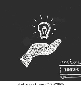 Vector illustration isolated on black, solution and idea concept, hand-drawn light bulb in a hand