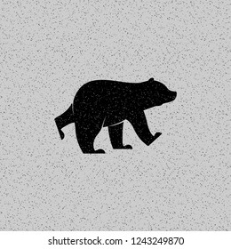 Vector illustration. Isolated silhouette bear icon on grunge background.