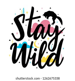 Vector illustration with jumping fox silhouette and lettering text - Stay Wild. Pink, blue, yellow stars, pine trees and clouds. Colored typography inspirational poster with handwritten words