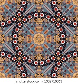 Vector illustration. Kaleidoscopic seamless pattern in gray, black and orange colors. It can be used in the design of textiles, in the printing industry.