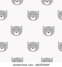 Vector illustration of kittens head on a white background.Cute cartoon kittens head, seamless pattern. Vector cute repeating pattern for fabric, Wallpaper or wrapping paper