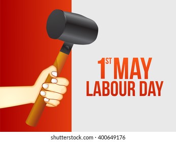 Vector illustration of Labour Day  typography concept with man holding hammer.