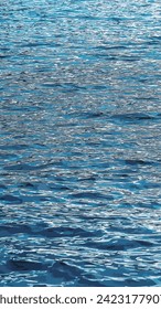 Vector illustration of Lake Traunsee water background in coastal area. Colorful texture of stones under water.
