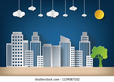 Vector illustration landscape city building with cloud and full moon. Paper art and craft style.