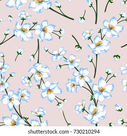 Vector illustration of large spring blossom branches. White-blue flowers and green stems on pastel background. Seamless pattern.