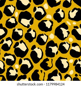Vector illustration leopard print seamless pattern. Yellow hand drawn background.