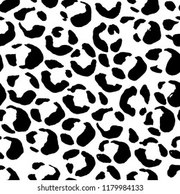 Vector illustration leopard print seamless pattern. Black and white hand drawn background.