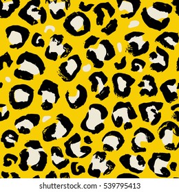 Vector illustration leopard print seamless pattern. Yellow hand drawn background
