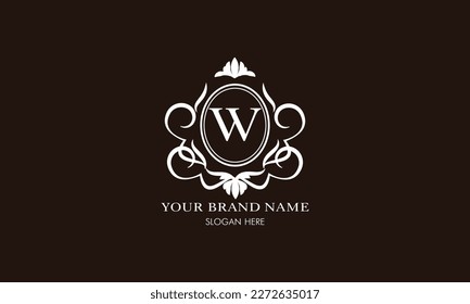 Vector illustration of letter W logo template. Classic floral monogram with decorative elements.