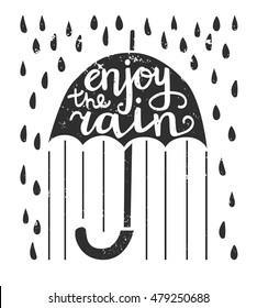Vector illustration with lettering Enjoy the rain. Umbrella with hand written phrase, raindrops and grunge texture isolated on white background. Card and poster design.