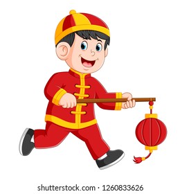 vector illustration of a liitle boy is running and holding the chinese paper latern