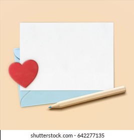 Vector illustration of love letter concept with little wooden pencil, blue envelope and white paper with big red heart