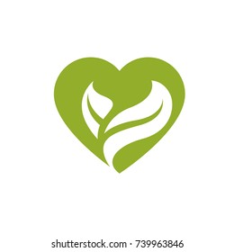 Vector illustration of loving heart decorated with green leaves. Phytotherapy metaphor, vector graphic emblem.