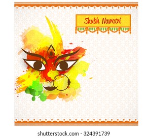 Vector illustration of Maa Durga in a colourful background for Happy Navratri.