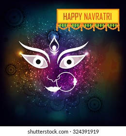 Vector illustration of Maa Durga in a colourful background for Happy Navratri.