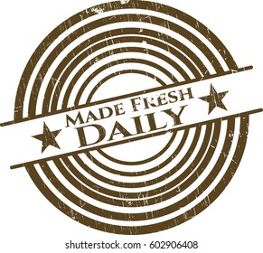 Vector illustration of Made Fresh Daily rubber grunge stamp
