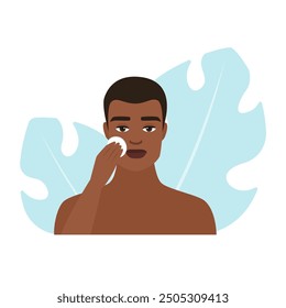 Vector illustration of a man cleansing his face with a cotton pad for skincare routine.