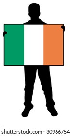 vector illustration of a  man holding a flag of ireland