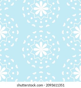 Vector illustration. Merry Christmas and Happy New Year seamless pattern. Lace background with round abstract snowflakes. Perforated bright patterns Papel Picado pattern.