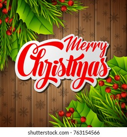 Vector illustration of Merry christmas text on paper label with fir branches and holly berry leaves over brown wooden background