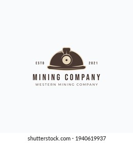 Vector illustration of miners hard hat with lamp. Vintage mining hard hat logo design