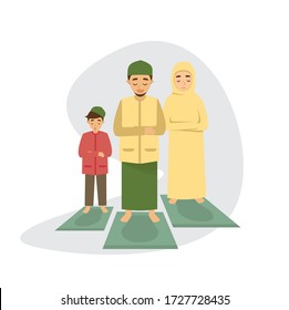 A vector illustration of Muslim familiy Praying together.