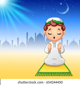 Vector Illustration Of  Muslim Kid Sitting On The Prayer Rug While Praying