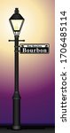 A vector illustration of a New Orleans Bourbon Street lamp post and street sign glowing on a yellow and purple background.
